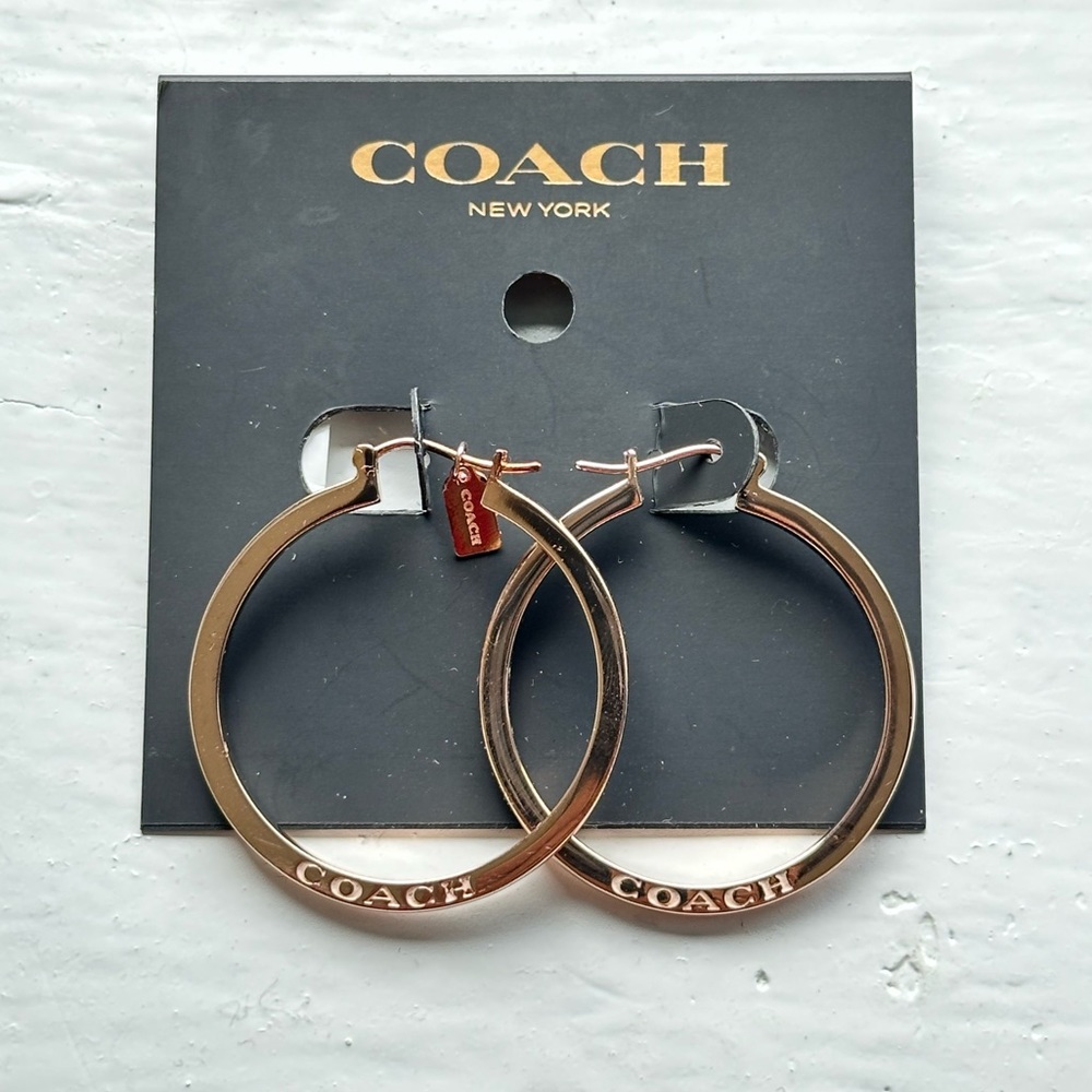 Rosegold Medium Thick Hoop Earrings Brand: Coach
